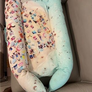 Dockatot Deluxe with unique beach cover